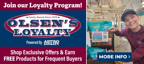 Promotional banner for Olsen's Loyalty Program powered by Astro Loyalty. Text reads 'Join our Loyalty Program! Shop Exclusive Offers & Earn FREE Products for Frequent Buyers.' Includes smiling employee pointing to a RawTernative pet food display with a QR code and sign for loyalty rewards. A 'More Info' button is also shown.